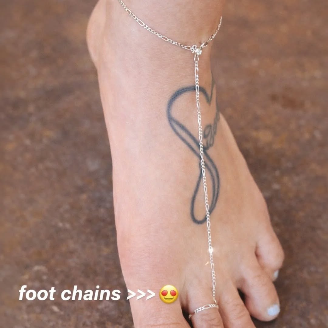 Sterling silver permanent foot chain anklet with toe ring loop on a tattooed foot — Athens, GA welded jewelry